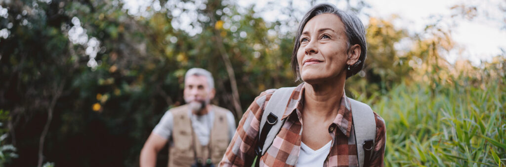Adventurous older couple hiking