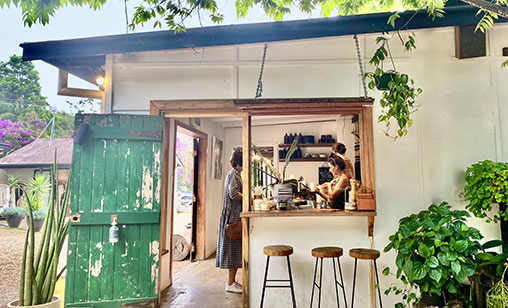 Young first home buyers in Northern NSW at a café and planning their first home purchase with guarantor support.