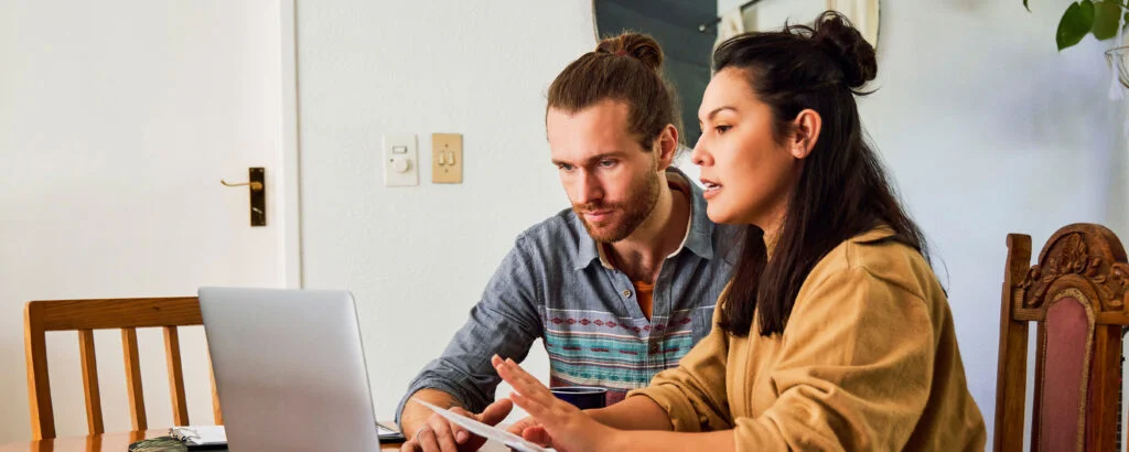 Couple discussing finances.